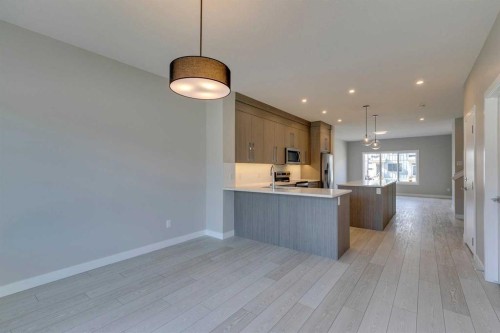 642 & 646 Rangeview Street Se, Calgary, AB - Indoor Photo Showing Kitchen
