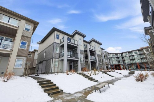 162 Spring Creek Common Sw, Calgary, AB - Outdoor With Balcony With Facade