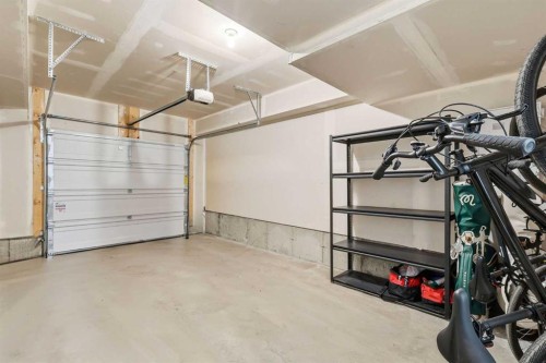 162 Spring Creek Common Sw, Calgary, AB - Indoor Photo Showing Garage