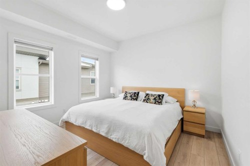 162 Spring Creek Common Sw, Calgary, AB - Indoor Photo Showing Bedroom