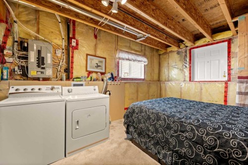 164 Stonegate Close Nw, Airdrie, AB - Indoor Photo Showing Laundry Room