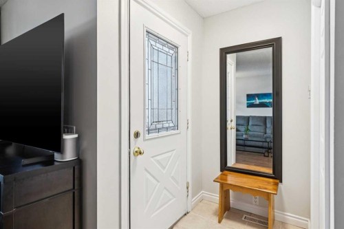 42 Cedarwood Hill Sw, Calgary, AB - Indoor Photo Showing Other Room