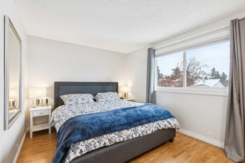 42 Cedarwood Hill Sw, Calgary, AB - Indoor Photo Showing Bedroom