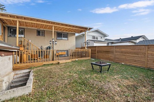 255 Rundleridge Drive Ne, Calgary, AB - Outdoor With Deck Patio Veranda