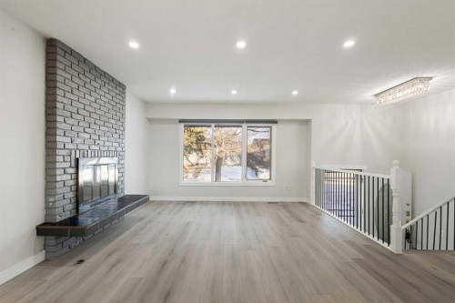 255 Rundleridge Drive Ne, Calgary, AB - Indoor With Fireplace