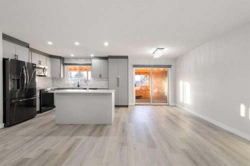 255 Rundleridge Drive Ne, Calgary, AB - Indoor Photo Showing Kitchen With Stainless Steel Kitchen With Upgraded Kitchen