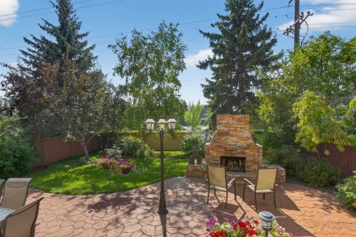 11 Sun Canyon Park Se, Calgary, AB - Outdoor With Backyard