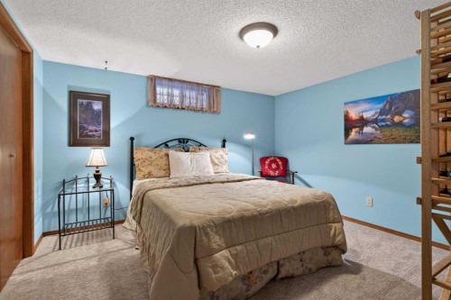11 Sun Canyon Park Se, Calgary, AB - Indoor Photo Showing Bedroom