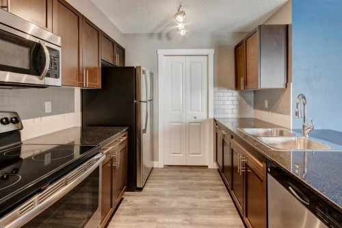 514-20 Kincora Glen Park Nw, Calgary, AB - Indoor Photo Showing Kitchen With Stainless Steel Kitchen With Double Sink