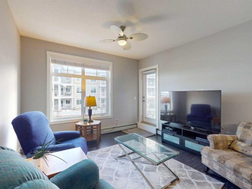 2207-3727 Sage Hill Drive Nw, Calgary, AB - Indoor Photo Showing Living Room