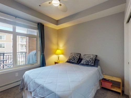 2207-3727 Sage Hill Drive Nw, Calgary, AB - Indoor Photo Showing Bedroom