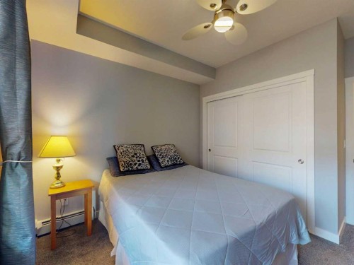 2207-3727 Sage Hill Drive Nw, Calgary, AB - Indoor Photo Showing Bedroom