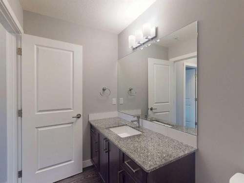 2207-3727 Sage Hill Drive Nw, Calgary, AB - Indoor Photo Showing Bathroom
