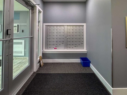 2207-3727 Sage Hill Drive Nw, Calgary, AB - Indoor Photo Showing Other Room