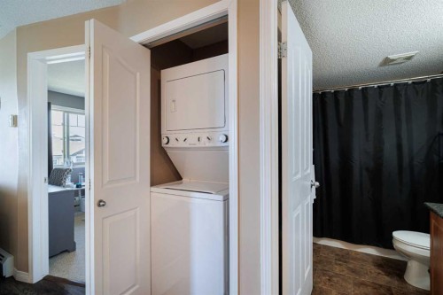3418-60 Panatella Street Nw, Calgary, AB - Indoor Photo Showing Laundry Room