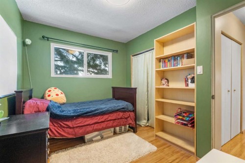 7819 Fairmount Drive Se, Calgary, AB - Indoor Photo Showing Bedroom