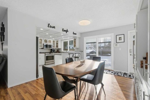 127 Queen Tamara Road Se, Calgary, AB - Indoor Photo Showing Dining Room