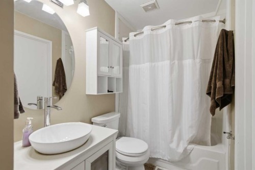 127 Queen Tamara Road Se, Calgary, AB - Indoor Photo Showing Bathroom