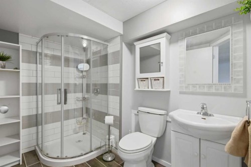 127 Queen Tamara Road Se, Calgary, AB - Indoor Photo Showing Bathroom