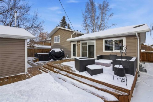 127 Queen Tamara Road Se, Calgary, AB - Outdoor With Deck Patio Veranda With Exterior