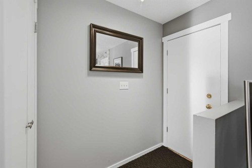 127 Queen Tamara Road Se, Calgary, AB - Indoor Photo Showing Other Room