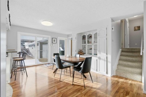 127 Queen Tamara Road Se, Calgary, AB - Indoor Photo Showing Dining Room