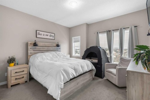811-250 Fireside View, Cochrane, AB - Indoor Photo Showing Bedroom