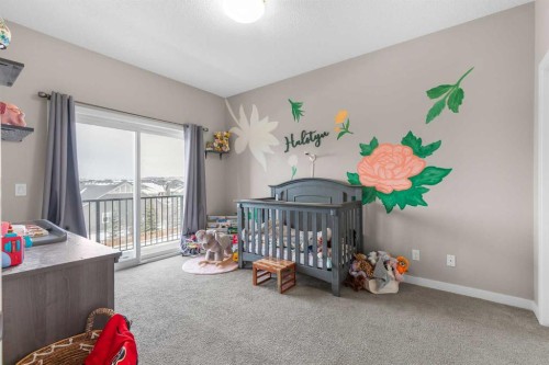 811-250 Fireside View, Cochrane, AB - Indoor Photo Showing Bedroom