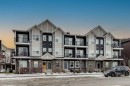 811-250 Fireside View, Cochrane, AB  - Outdoor With Balcony With Facade 