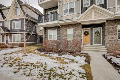 811-250 Fireside View, Cochrane, AB - Outdoor With Balcony With Facade