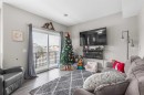 811-250 Fireside View, Cochrane, AB  - Indoor Photo Showing Living Room 