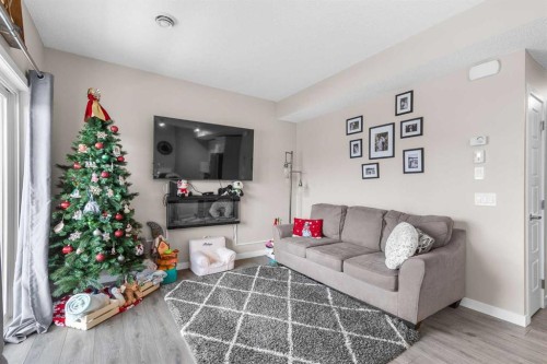 811-250 Fireside View, Cochrane, AB - Indoor Photo Showing Living Room