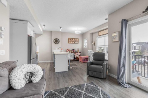 811-250 Fireside View, Cochrane, AB - Indoor Photo Showing Living Room