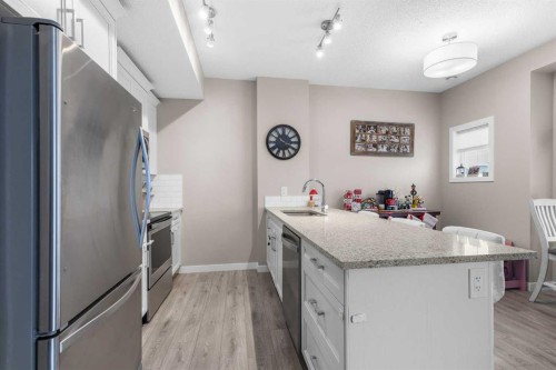 811-250 Fireside View, Cochrane, AB - Indoor Photo Showing Kitchen