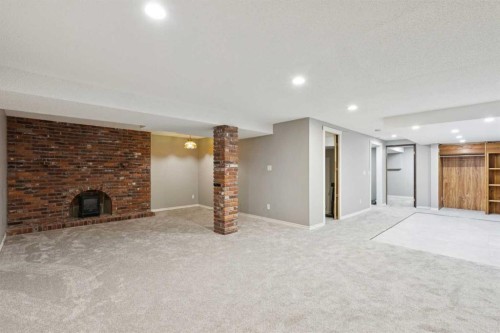 5432 Silverdale Drive Nw, Calgary, AB - Indoor With Fireplace