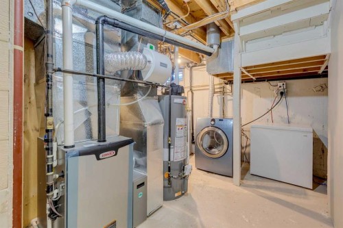 5432 Silverdale Drive Nw, Calgary, AB - Indoor Photo Showing Laundry Room