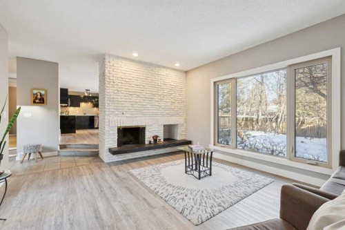 5432 Silverdale Drive Nw, Calgary, AB - Indoor Photo Showing Living Room With Fireplace
