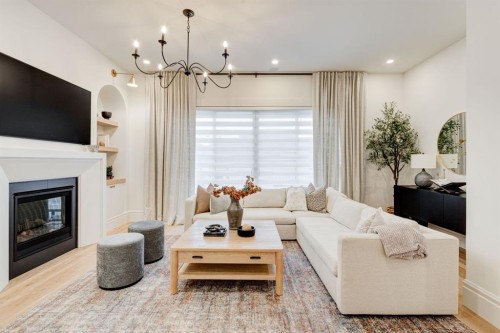 2810 26 St, Calgary, AB - Indoor Photo Showing Living Room With Fireplace