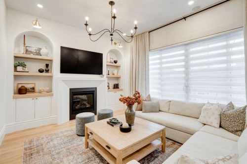2810 26 St, Calgary, AB - Indoor Photo Showing Living Room With Fireplace