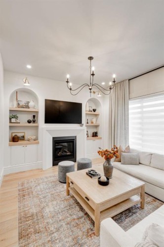 2810 26 St, Calgary, AB - Indoor Photo Showing Living Room With Fireplace