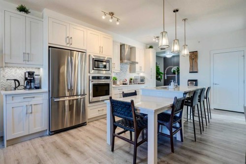 420-30 Walgrove Walk Se, Calgary, AB - Indoor Photo Showing Kitchen With Upgraded Kitchen