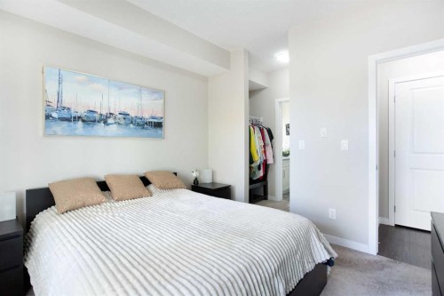 112-200 Cranfield Common Se, Calgary, AB - Indoor Photo Showing Bedroom