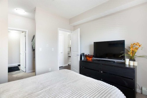 112-200 Cranfield Common Se, Calgary, AB - Indoor Photo Showing Bedroom