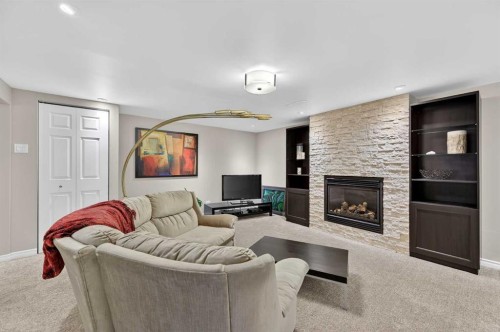920 42 Street Sw, Calgary, AB - Indoor Photo Showing Living Room With Fireplace