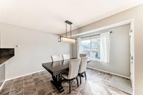 1809 Baywater Gardens Sw, Airdrie, AB - Indoor Photo Showing Dining Room