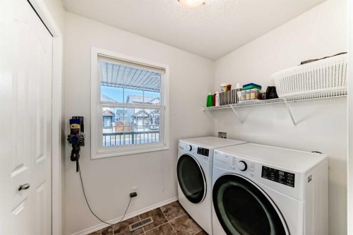 1809 Baywater Gardens Sw, Airdrie, AB - Indoor Photo Showing Laundry Room