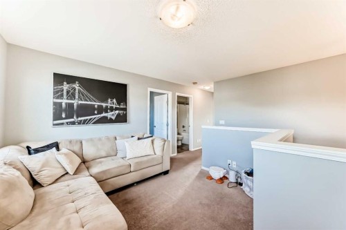 1809 Baywater Gardens Sw, Airdrie, AB - Indoor Photo Showing Living Room