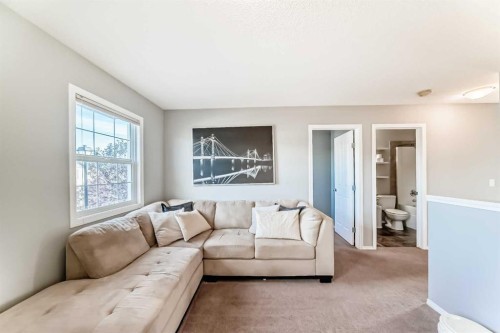 1809 Baywater Gardens Sw, Airdrie, AB - Indoor Photo Showing Living Room