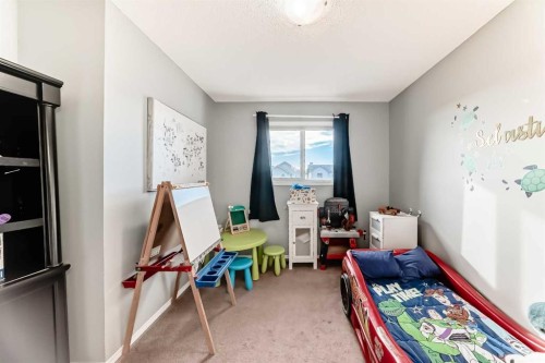 1809 Baywater Gardens Sw, Airdrie, AB - Indoor Photo Showing Bedroom