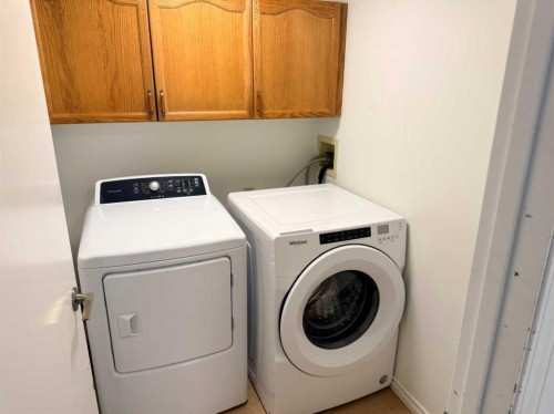 651 Macewan Drive Nw, Calgary, AB - Indoor Photo Showing Laundry Room